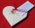 kartonage-herz-mandeln-gastgeschenke-hochzeittaubenundringe[1].jpg